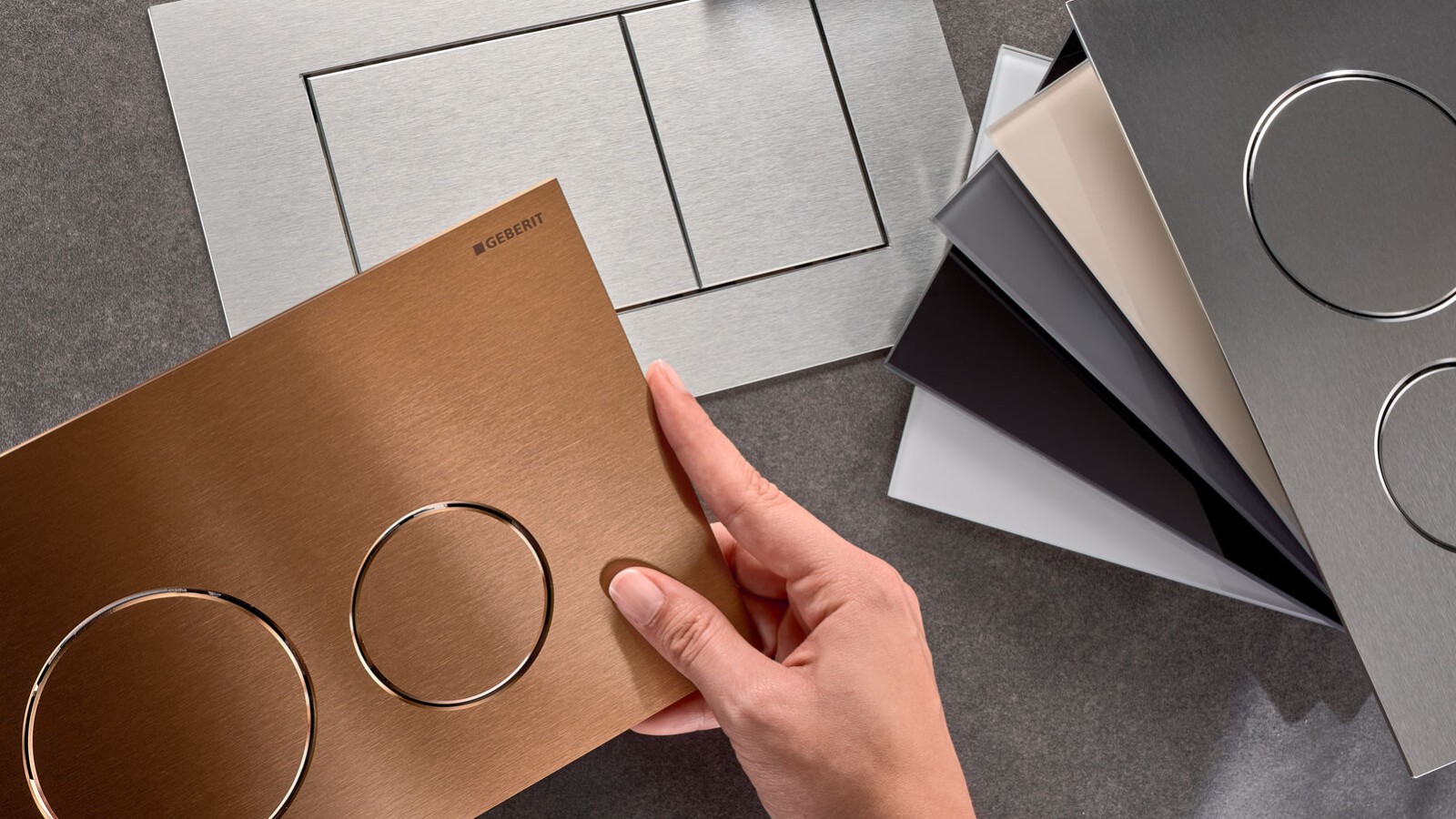 Geberit Sigma40 működtetőlapok különböző felületekkel és gombformákkal