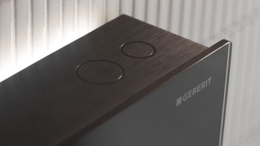 Geberit Monolith szanitermodul öblítést működtető gombjai (© Geberit)