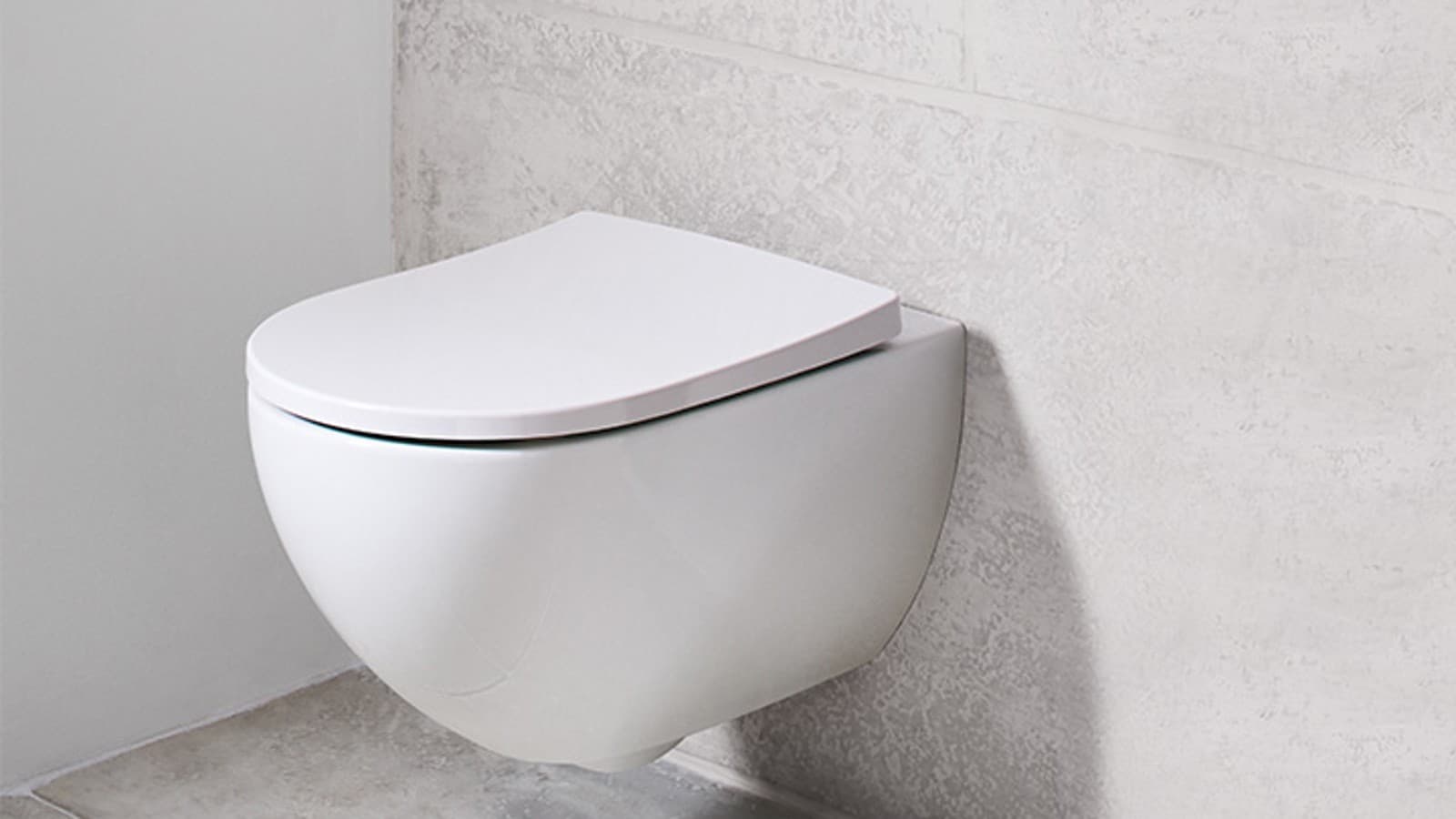 Falra szerelt WC a teljes felületen megvalósuló padlótisztításért Falra szerelt WC a teljes felületen megvalósuló padlótisztításért